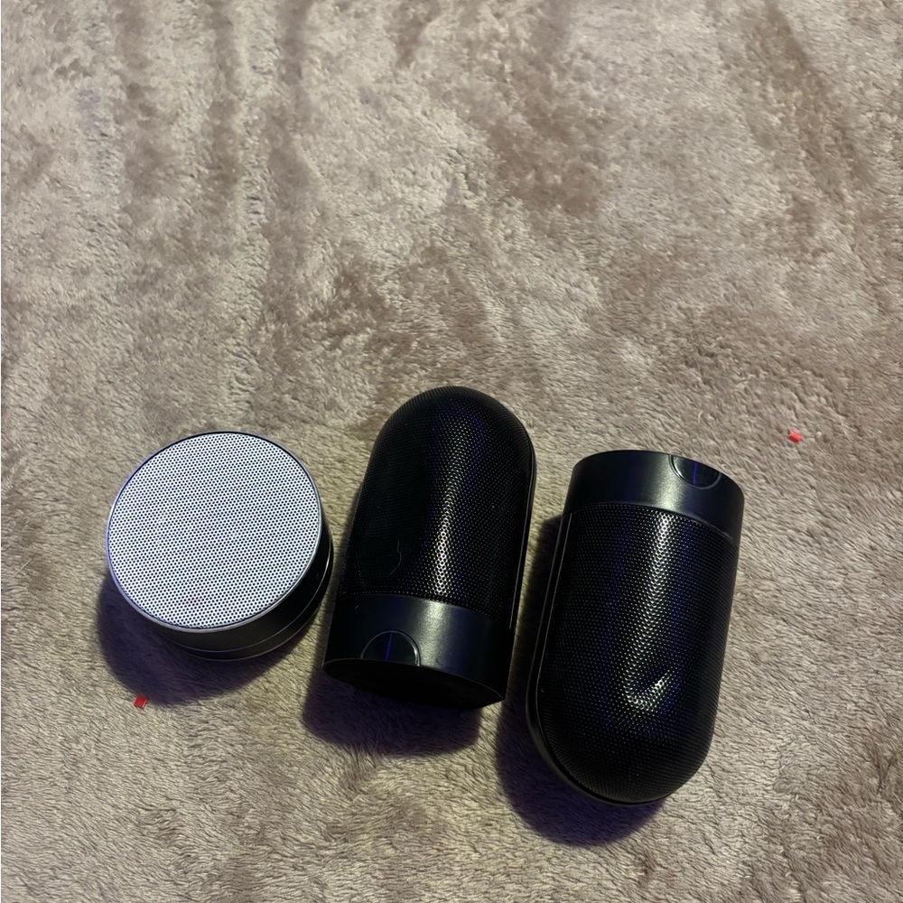 Black and Silver Wireless Speakers